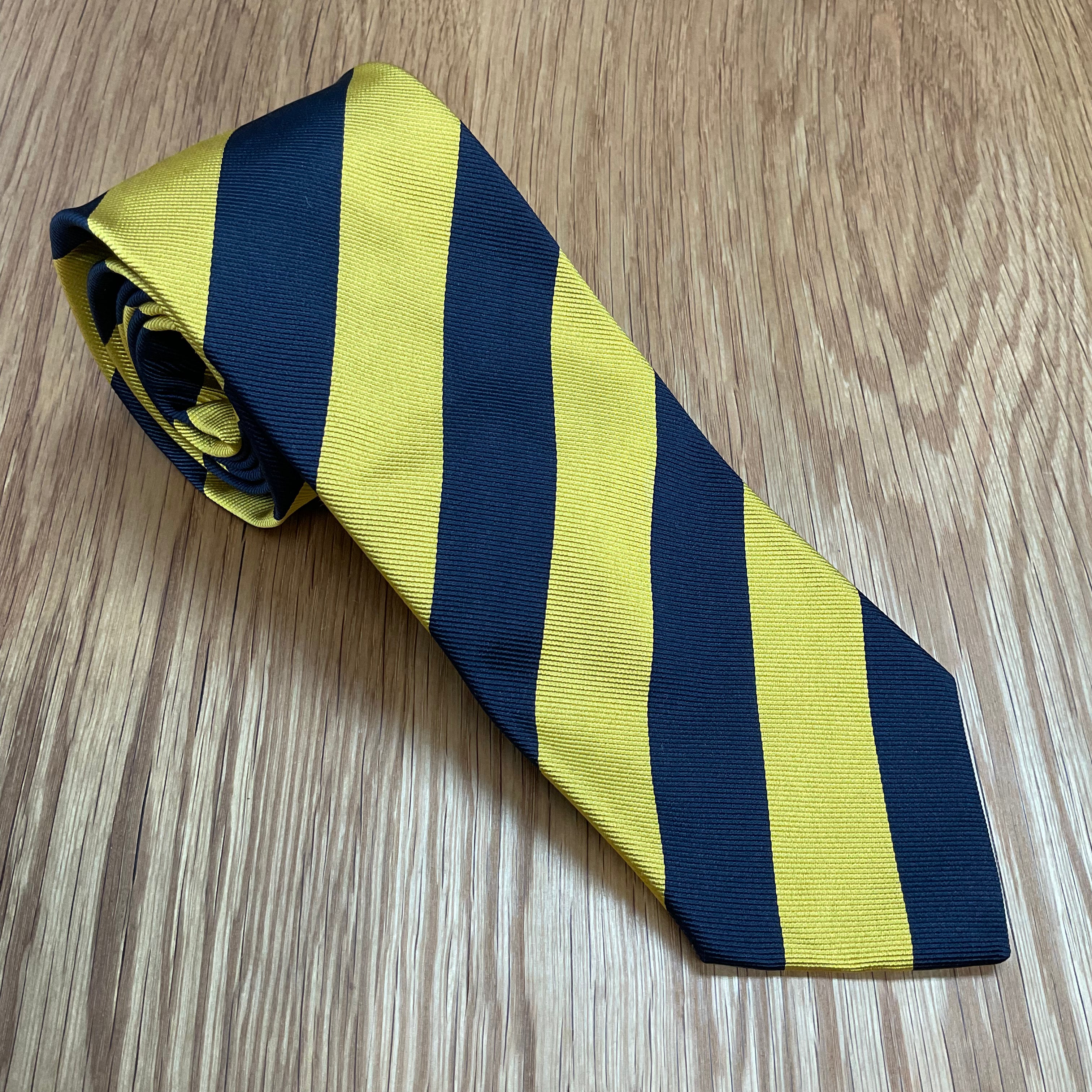 Navy and Yellow Silk Neck Tie Q. Contrary