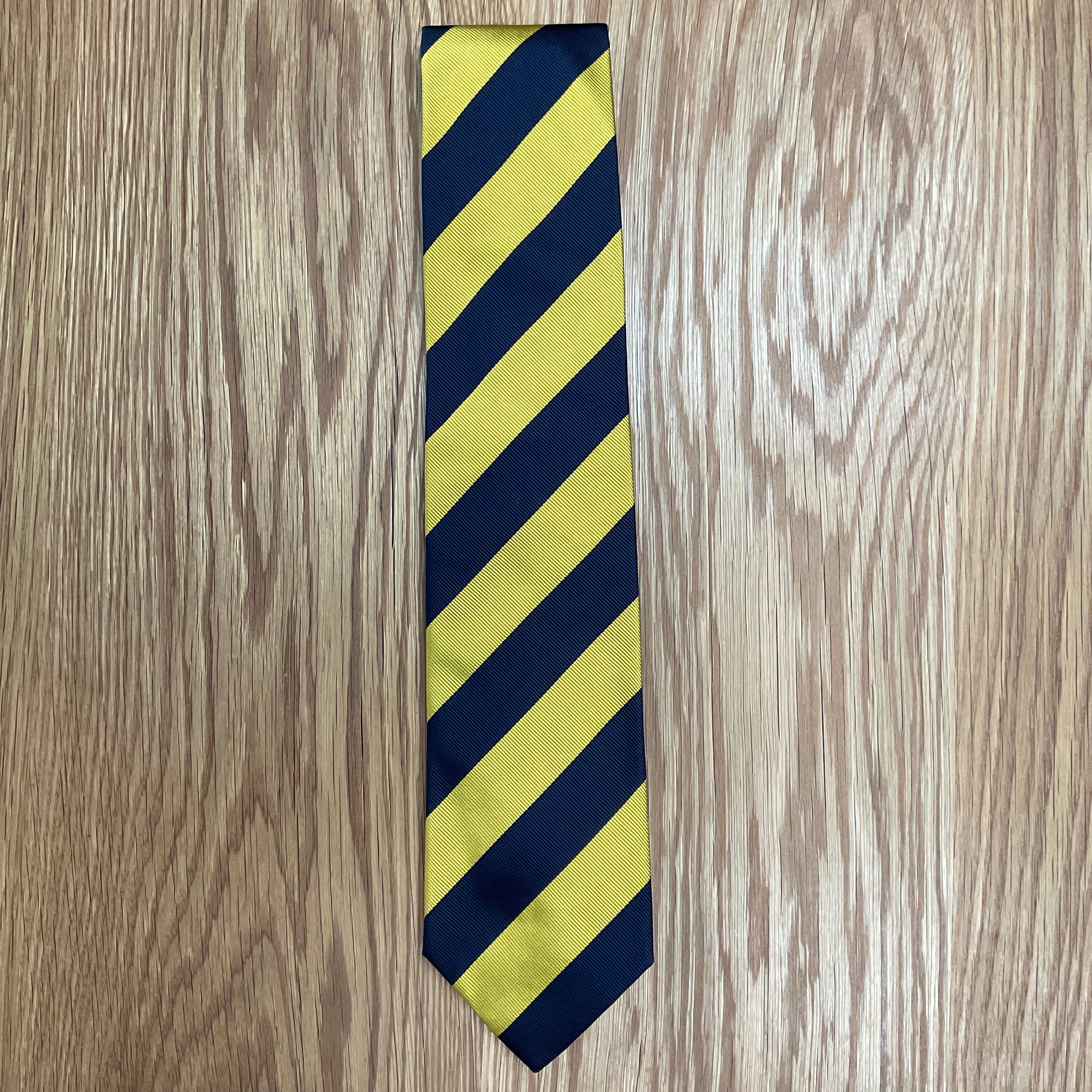 Navy and Yellow Silk Neck Tie Q. Contrary