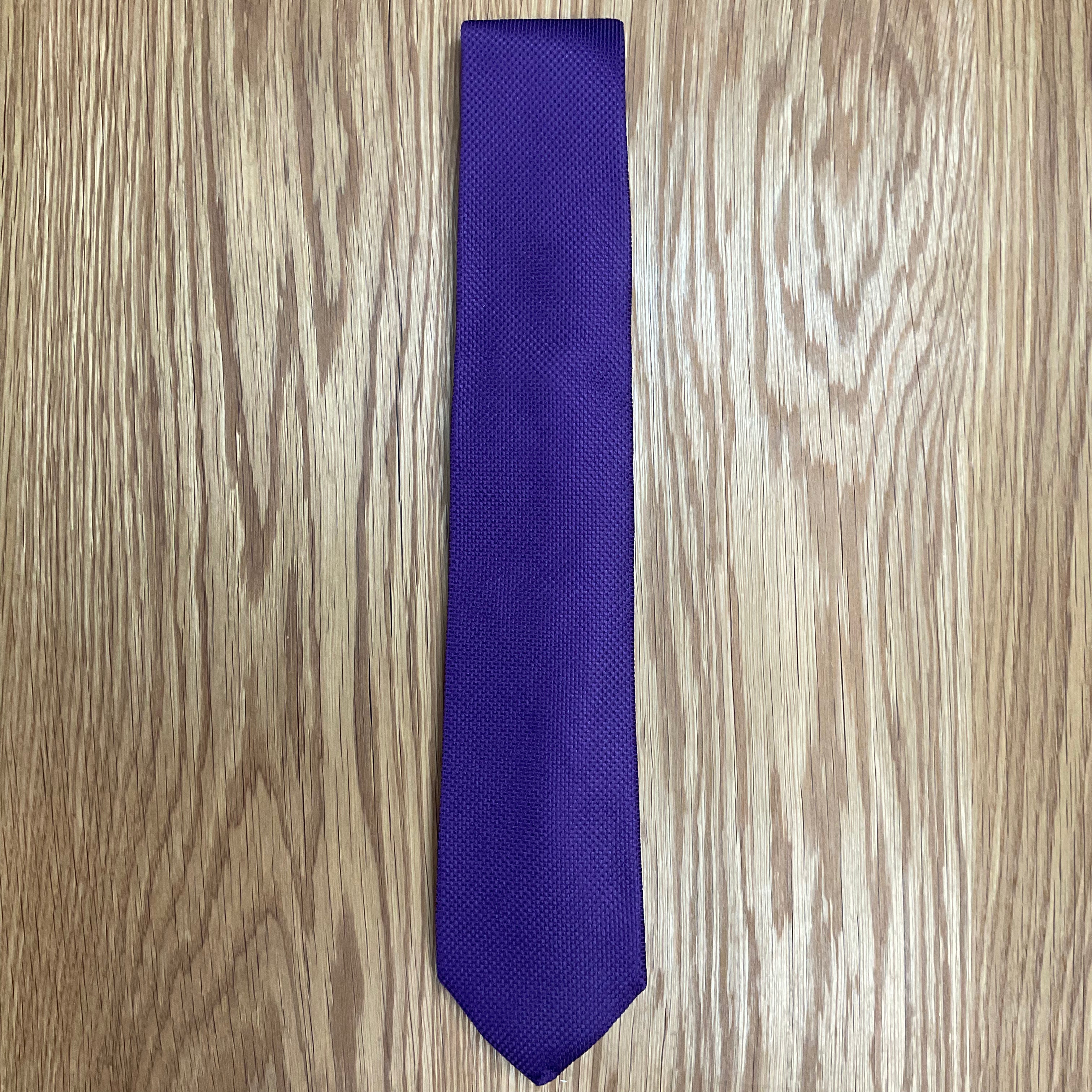 Solid Purple Textured Silk Tie Q. Contrary